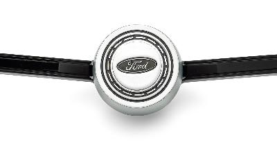 Early Bronco steering wheel with argent horn button.