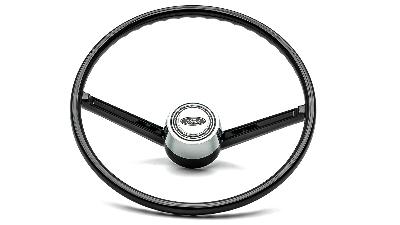 Early Bronco steering wheel with chrome horn button.
